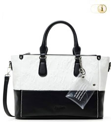 Handtasche Black & White mit einer Herzprägung oberseitig. Farbe: schwarz/weiss.