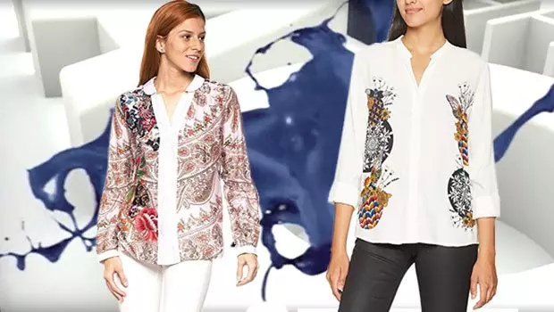 Zwei junge Frauen mit weißen Desigual Hemden. Ein Hemd bunt allover mit Mustern bedruckt und das andere nur rechts und links mit Musterung bedruckt.