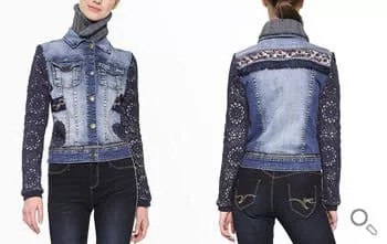 Blaue Desigual Jeansjacke mit Baumwollstoffärmeln im Lochmuster. Mit zierlichen glänzenden Bordüren und Mandalabestickung im unteren Bereich.