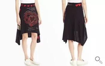 Schwarzer asymmetrischer Desigual Rock mit roten Herzen am Bund. Auf der Vorderseite großflächig ein Muster als vielen Herzen und weißer Handschrift.